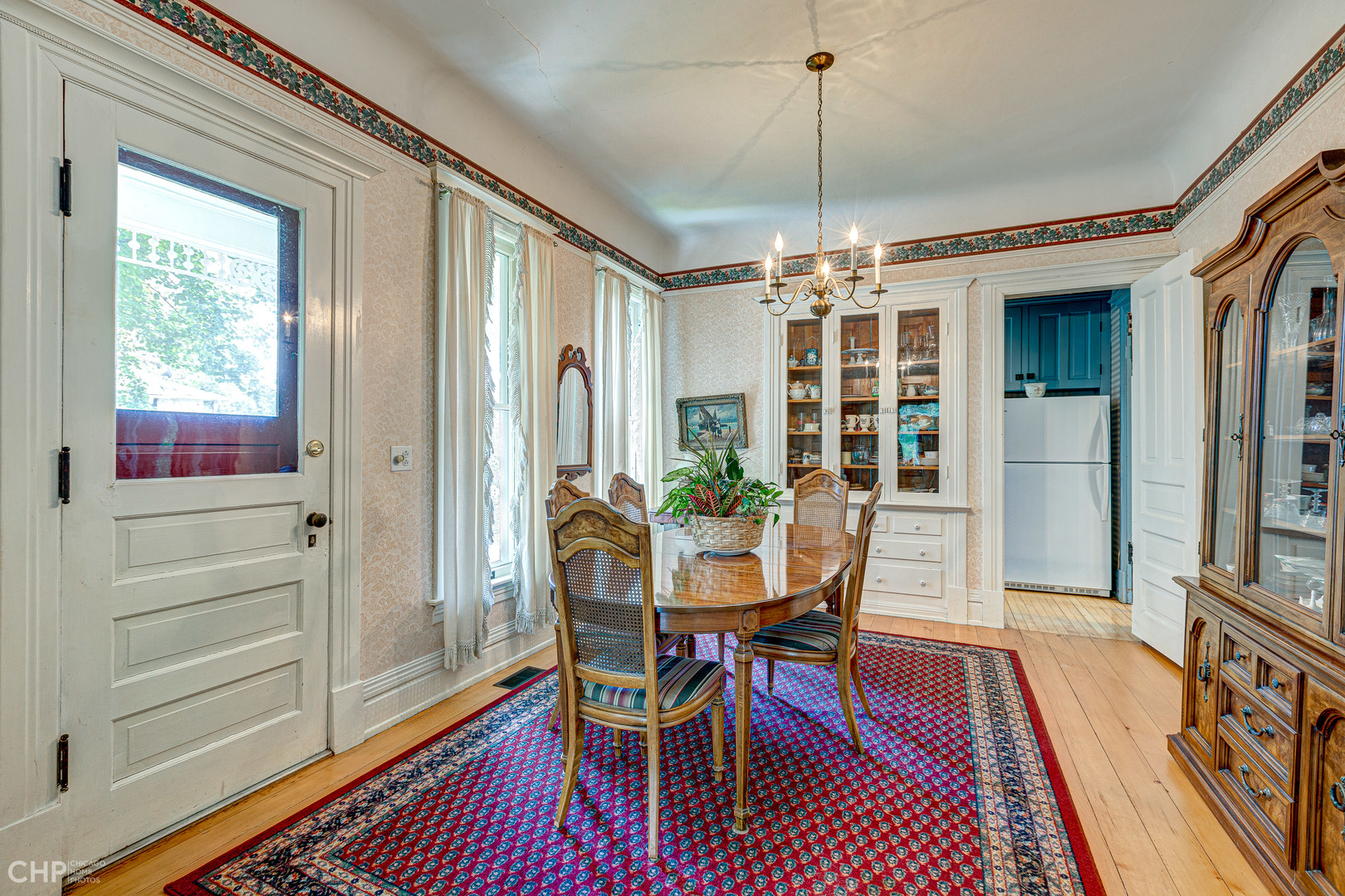 5725 Broadway Road Richmond, IL 60071 - Photo 12 of 26 a view of a dining room with furniture window and wooden floor