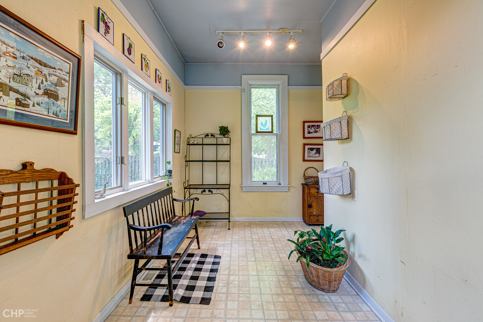 5725 Broadway Road Richmond, IL 60071 - Photo 17 of 26 a view of a entryway with furniture and floor to ceiling window