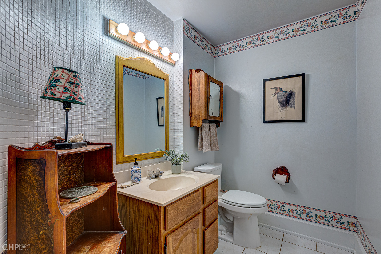 5725 Broadway Road Richmond, IL 60071 - Photo 20 of 26 a bathroom with a toilet sink and mirror