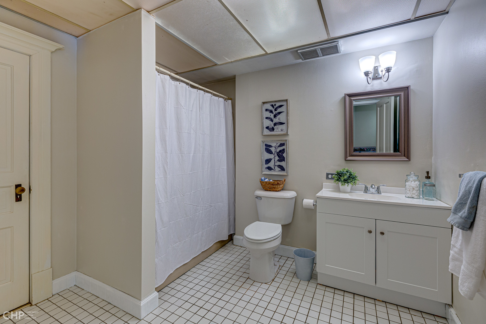 5725 Broadway Road Richmond, IL 60071 - Photo 26 of 26 a bathroom with a sink toilet a mirror and shower