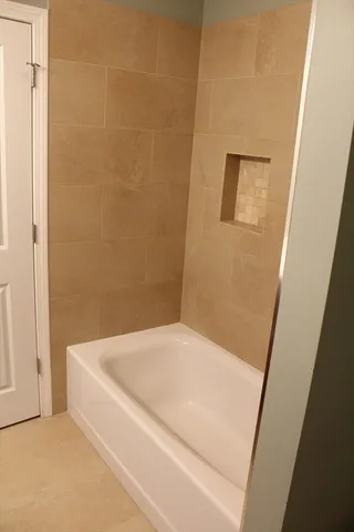 a bathroom with a bathtub
