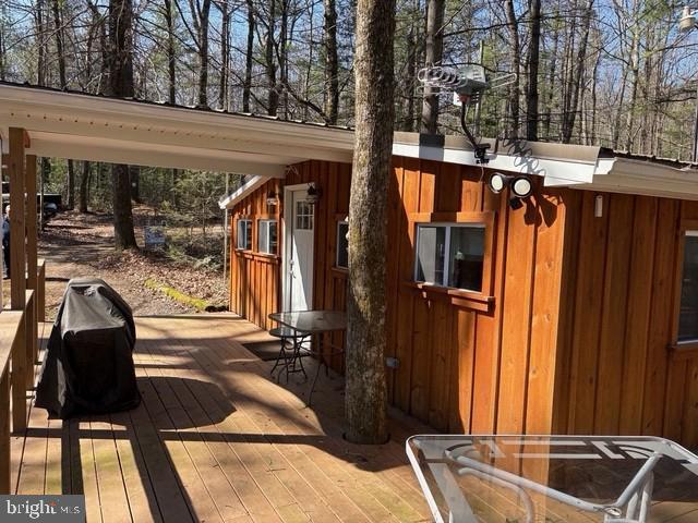 465 Miltonberger Road Orrtanna, PA 17353 - Photo 3 of 13 a view of a house with a tub and trees in the background