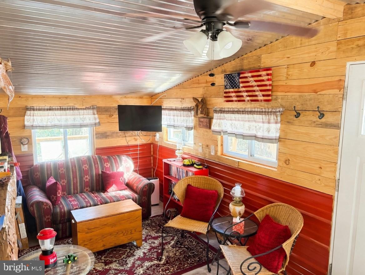 465 Miltonberger Road Orrtanna, PA 17353 - Photo 9 of 13 a living room with furniture and a flat screen tv