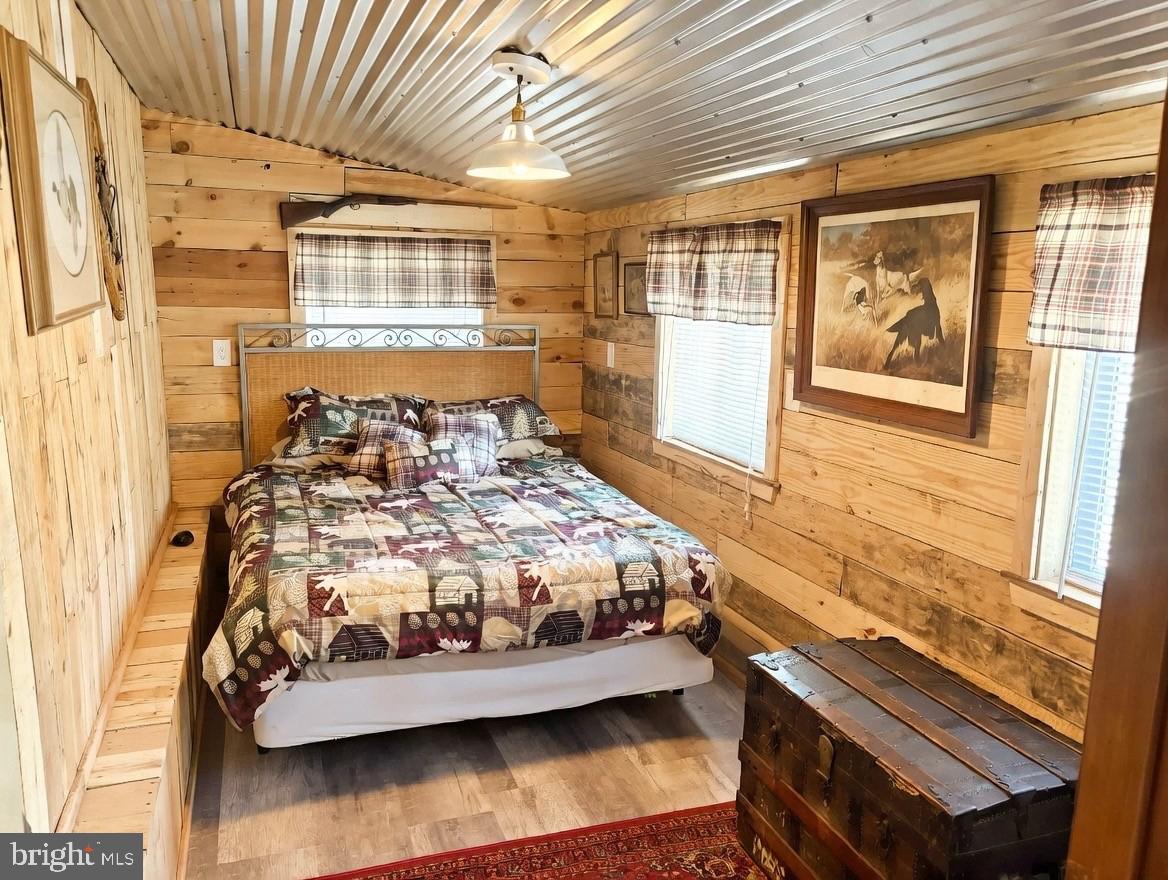 465 Miltonberger Road Orrtanna, PA 17353 - Photo 10 of 13 a bed sitting in a spacious bedroom next to a window