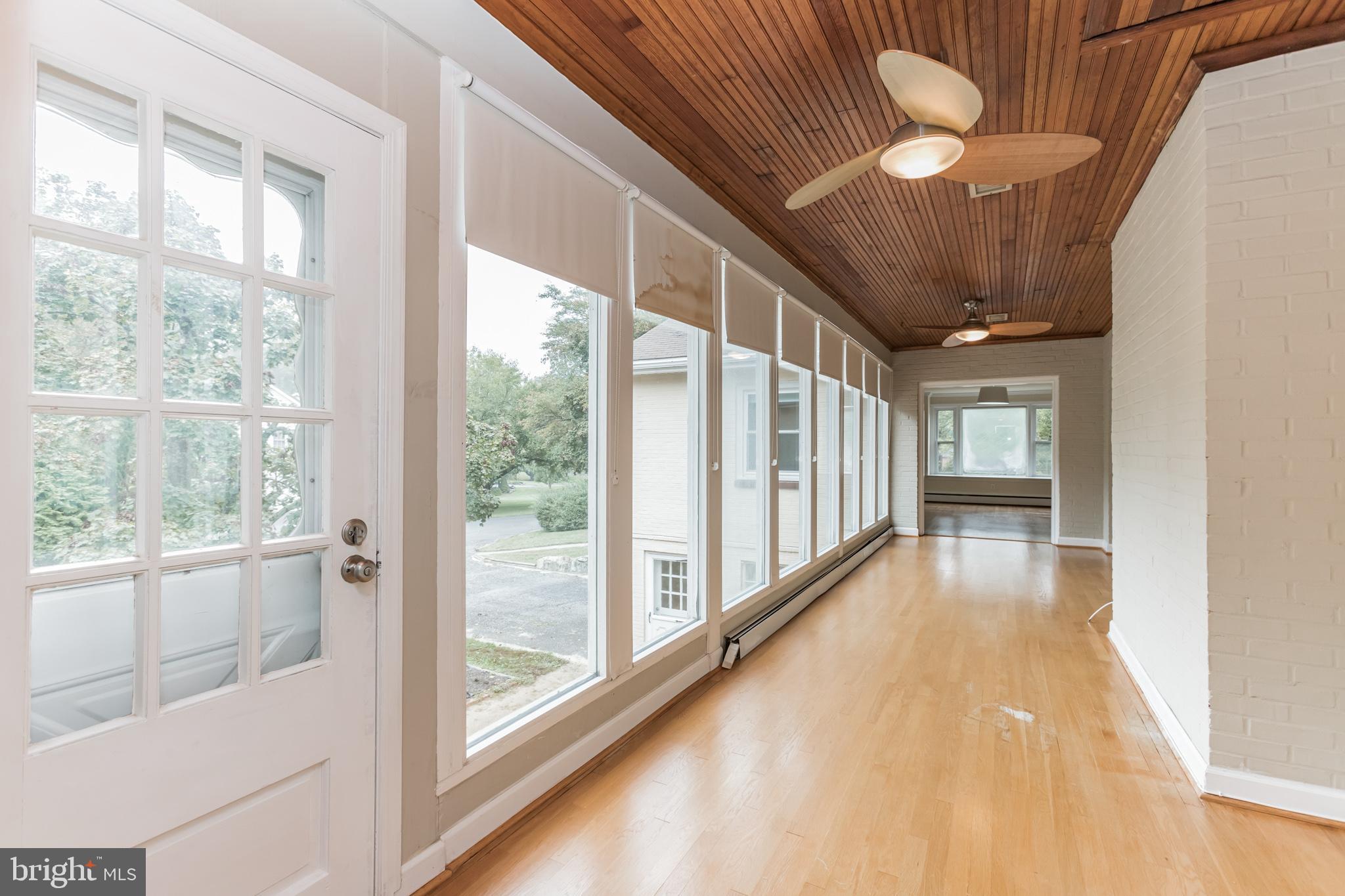 2100 Marymont Road Silver Spring, MD 20906 - Photo 13 of 37 Sunroom showing exit to yard