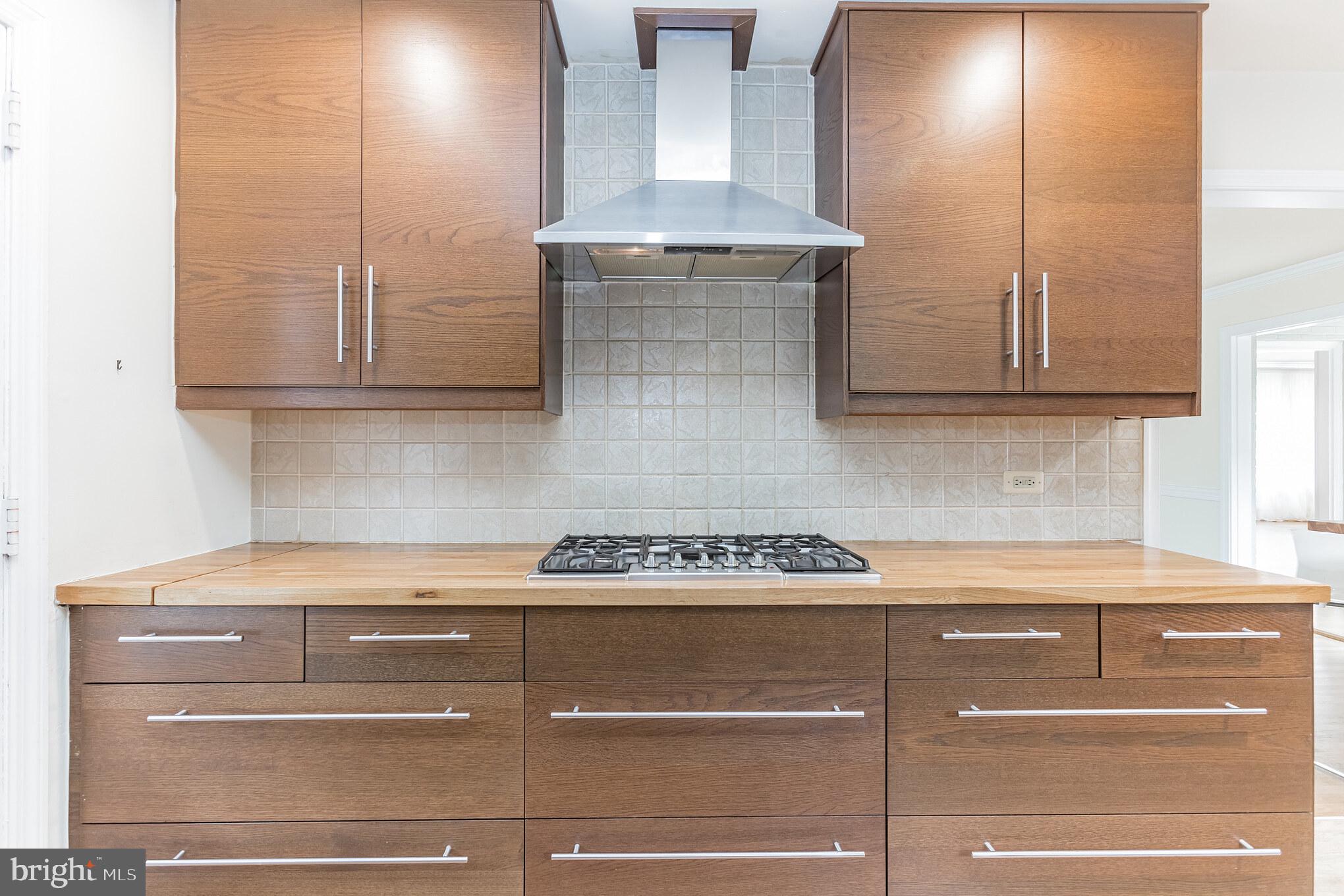 2100 Marymont Road Silver Spring, MD 20906 - Photo 5 of 37 Kitchen has a propane fueled gas cooktop