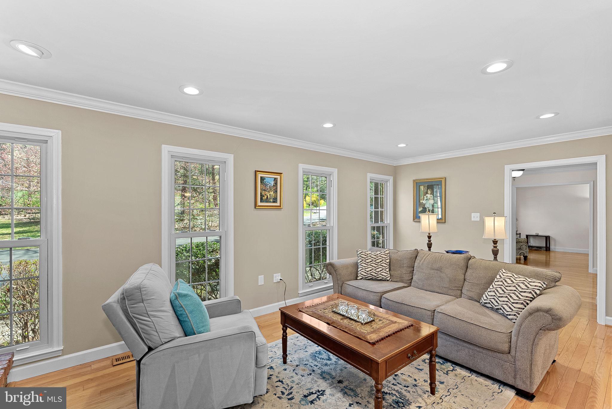 2804 Bree Hill Road Oakton, VA 22124 - Photo 13 of 46 a living room with furniture potted plant and a window