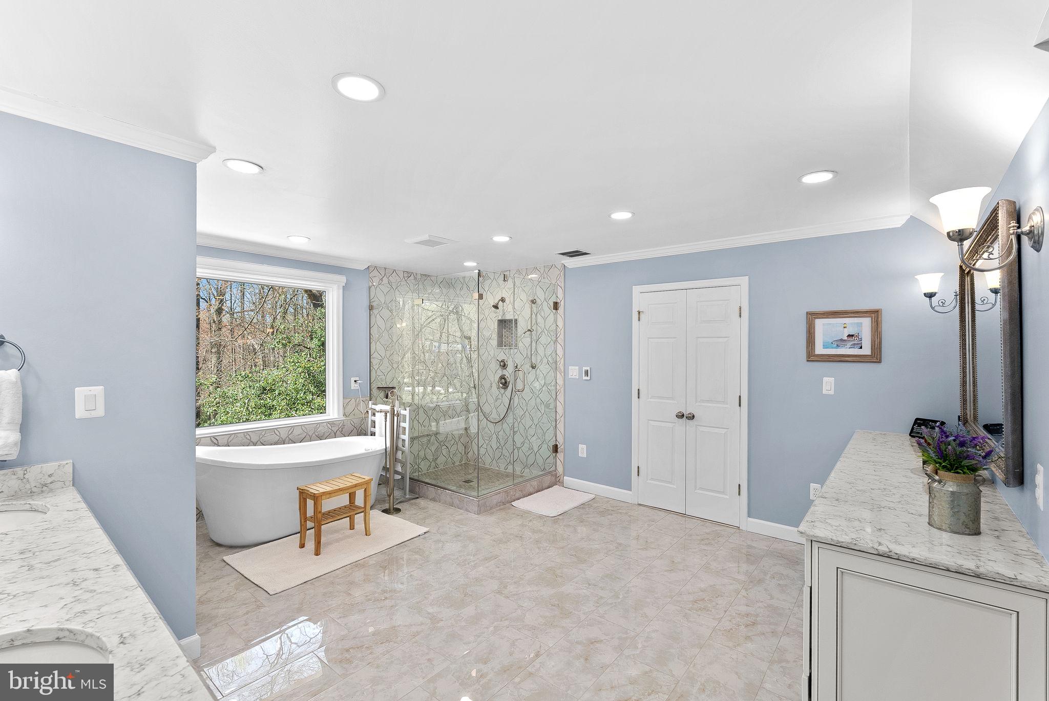 2804 Bree Hill Road Oakton, VA 22124 - Photo 24 of 46 a bathroom with a granite countertop sink a toilet and a tub