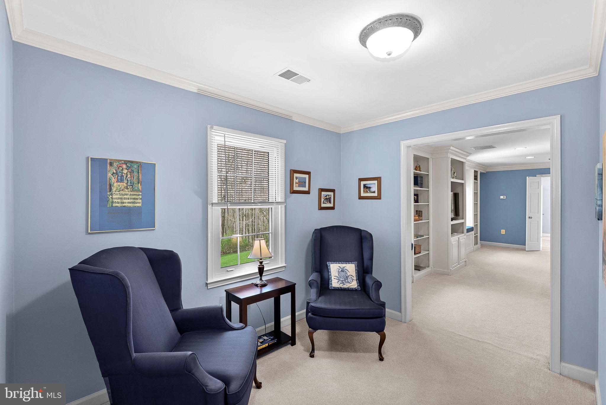 2804 Bree Hill Road Oakton, VA 22124 - Photo 30 of 46 a living room with furniture and a window
