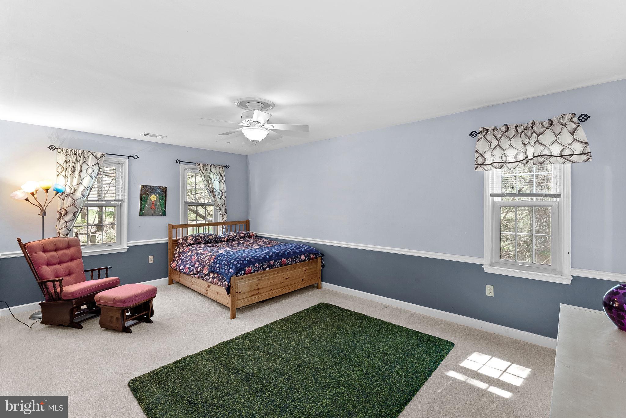 2804 Bree Hill Road Oakton, VA 22124 - Photo 32 of 46 a living room with furniture rug and window