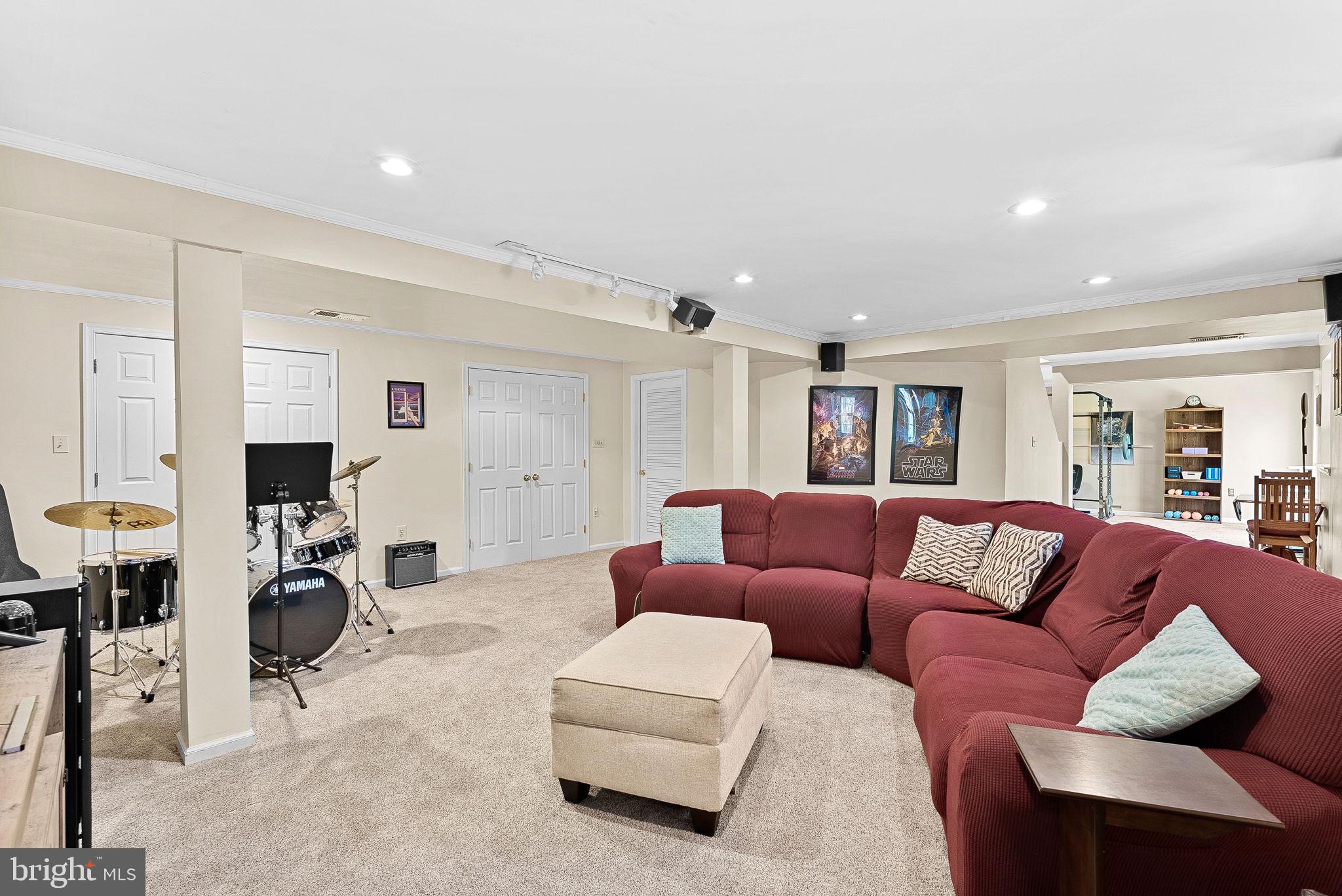 2804 Bree Hill Road Oakton, VA 22124 - Photo 38 of 46 a living room with furniture gym equipment and a window