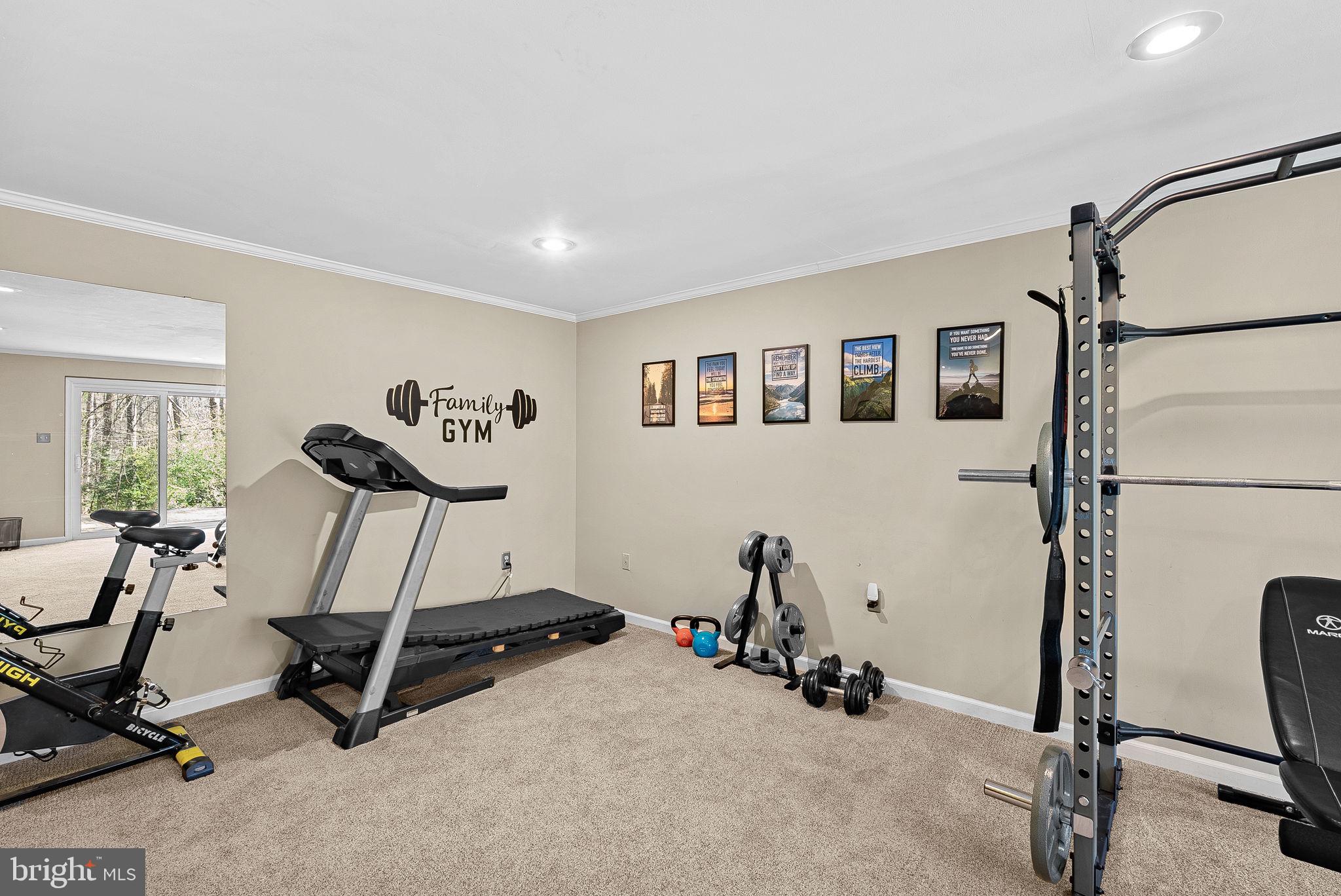 2804 Bree Hill Road Oakton, VA 22124 - Photo 40 of 46 a view of a workspace with gym equipment