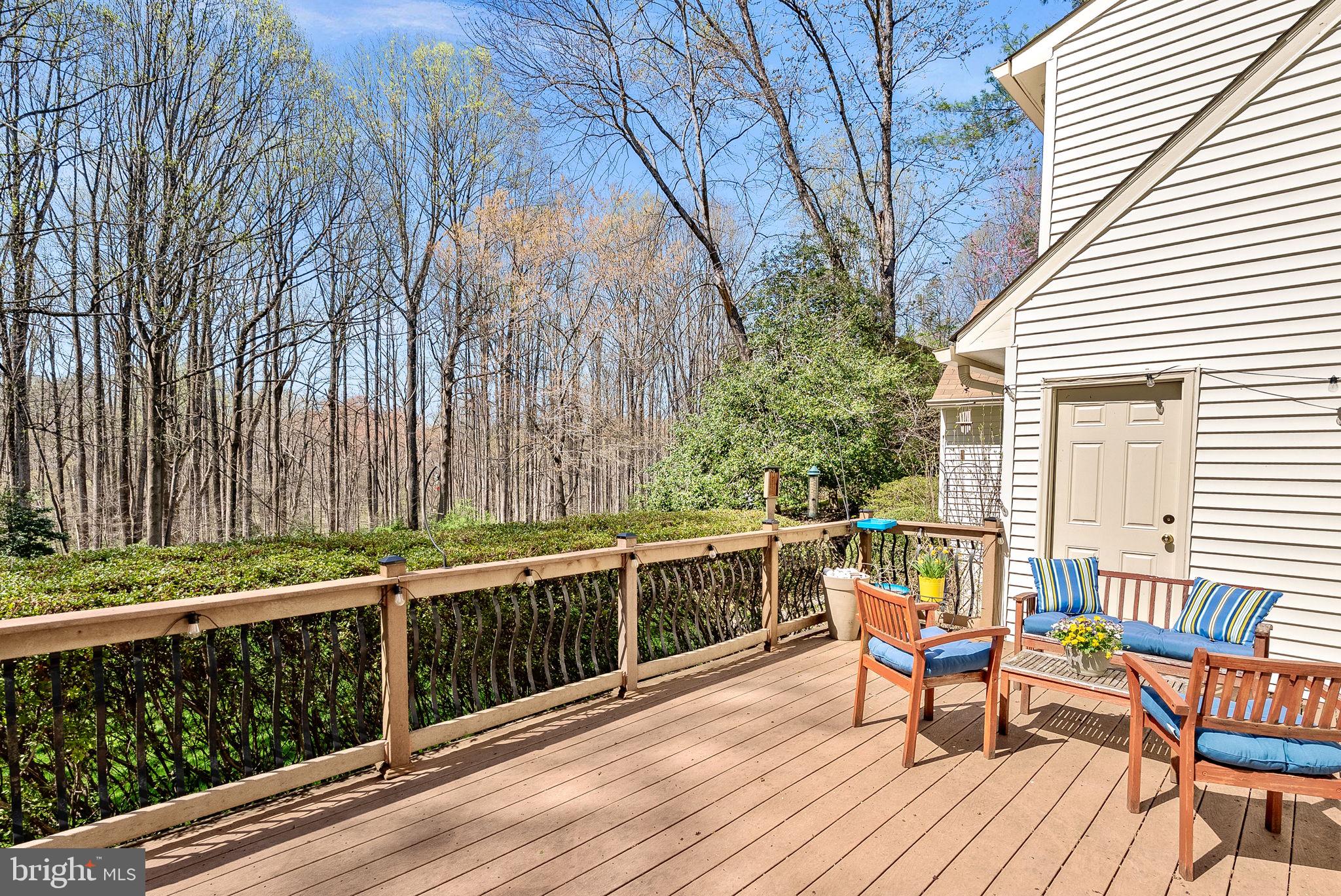 2804 Bree Hill Road Oakton, VA 22124 - Photo 44 of 46 a view of balcony with wooden floor and outdoor seating