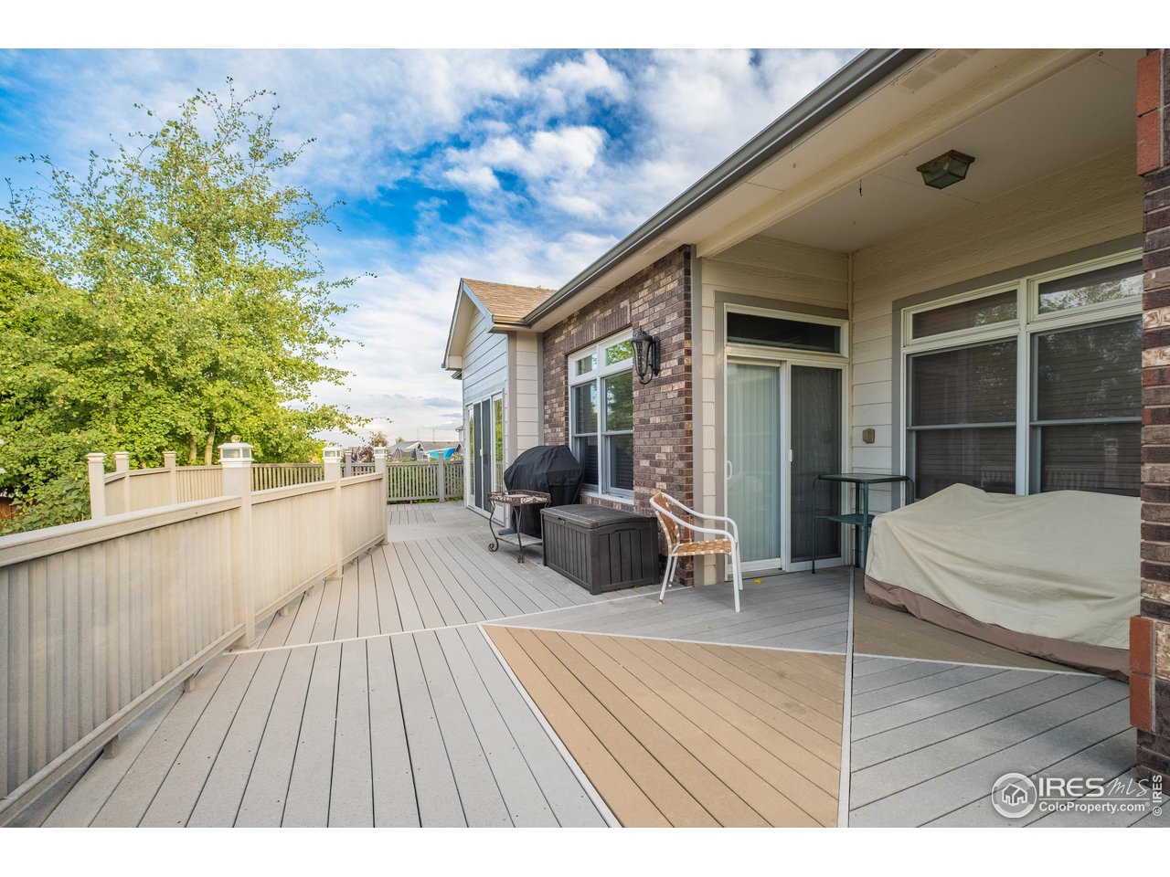 4313 29th Street Road Greeley, CO 80634 - Photo 25 of 31 Wraparound composite deck.