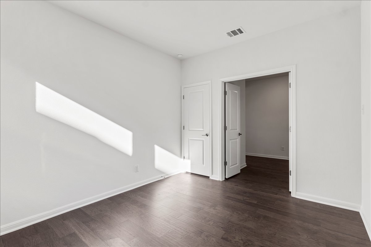 133 Grn Knl Lane Georgetown, TX 78628 - Photo 24 of 31 a view of a livingroom with wooden floor