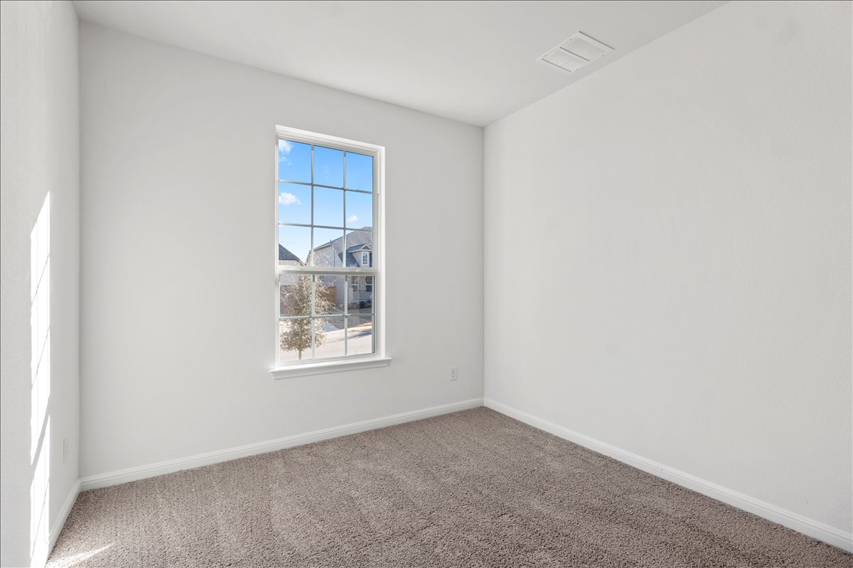 133 Grn Knl Lane Georgetown, TX 78628 - Photo 29 of 31 a view of an empty room with a window