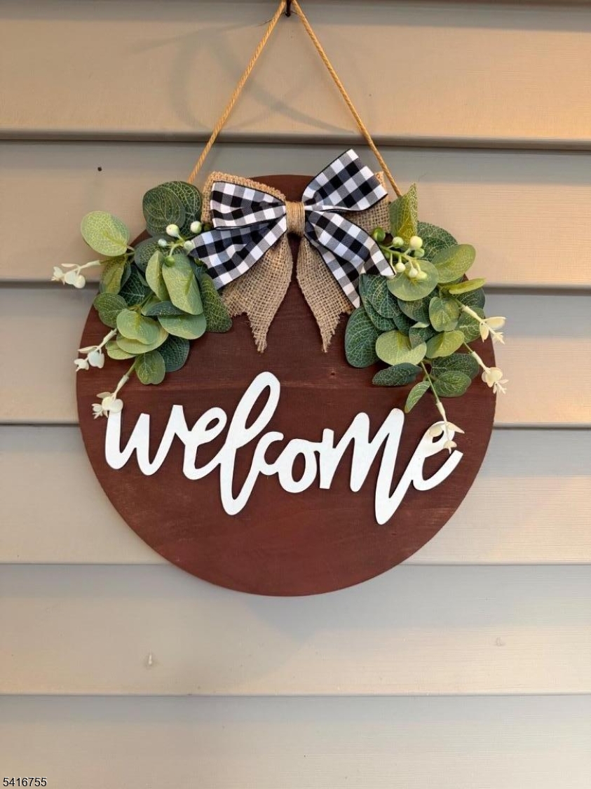 206 Pleasant Run Road Neshanic Station, NJ 08853 - Photo 2 of 36 a close up of a vase of flowers