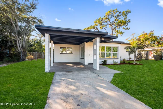 a view of a porch with a yard