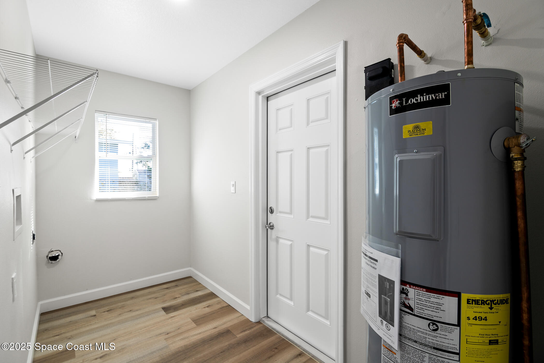 1107 Abington Street Cocoa, FL 32922 - Photo 9 of 20 a view of an entryway with wooden floor