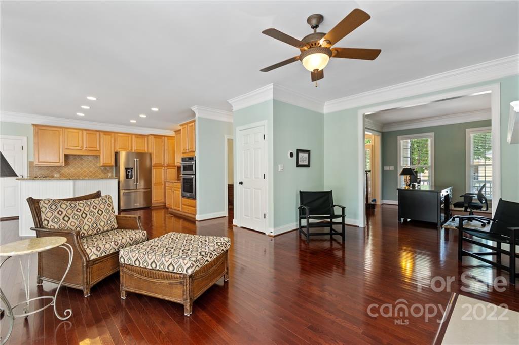 389 Third Baxter Street Fort Mill, SC 29708 - Photo 18 of 48 a living room with furniture and wooden floor