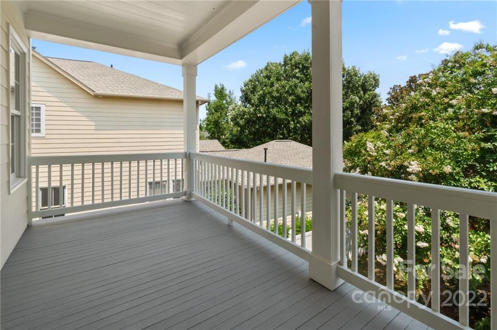389 Third Baxter Street Fort Mill, SC 29708 - Photo 24 of 48 a view of a balcony with wooden floor