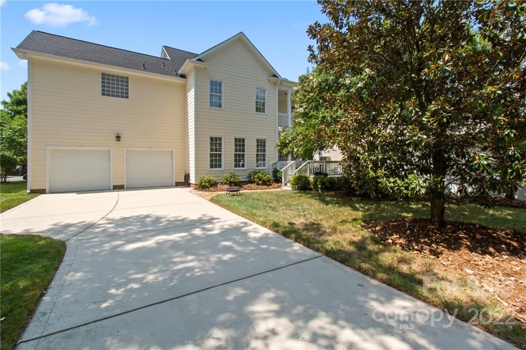 389 Third Baxter Street Fort Mill, SC 29708 - Photo 45 of 48 a front view of a house with a yard