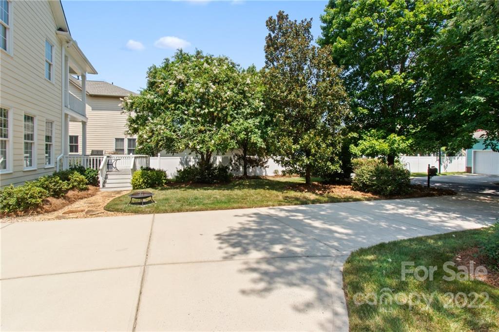 389 Third Baxter Street Fort Mill, SC 29708 - Photo 46 of 48 a view of a yard with plants and trees