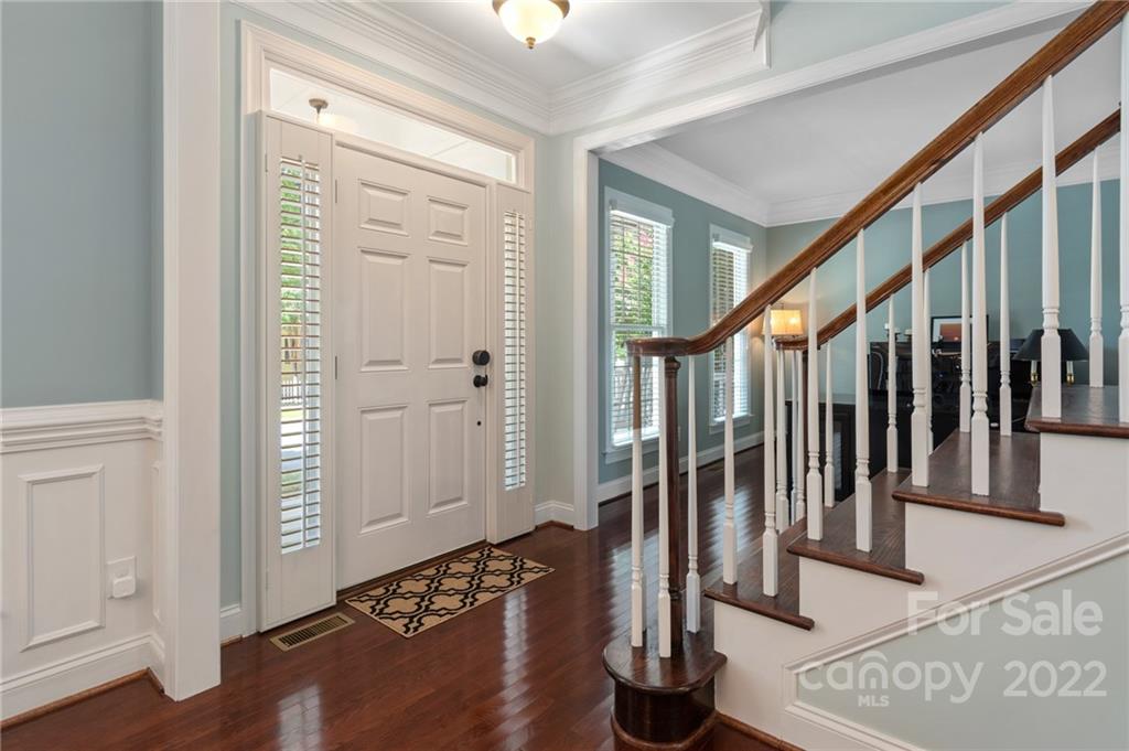 389 Third Baxter Street Fort Mill, SC 29708 - Photo 5 of 48 a view of entryway with wooden floor and stairs