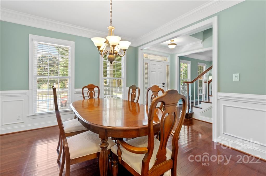 389 Third Baxter Street Fort Mill, SC 29708 - Photo 9 of 48 a view of a dining room with furniture window and wooden floor