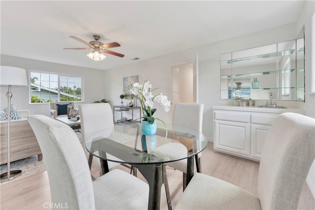 27282 Via Bella Dana Point, CA 92624 - Photo 19 of 50 a dining room with furniture and window