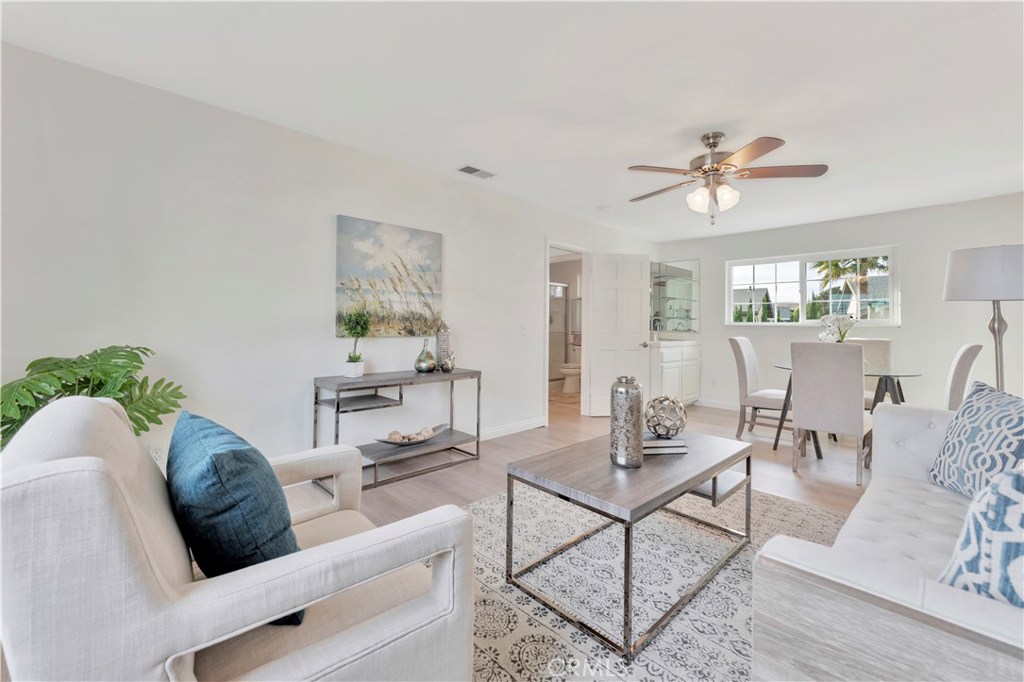 27282 Via Bella Dana Point, CA 92624 - Photo 21 of 50 a living room with furniture and a large window