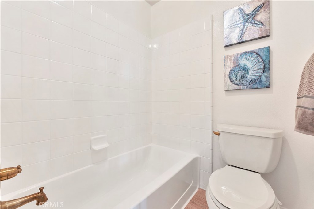 27282 Via Bella Dana Point, CA 92624 - Photo 48 of 50 a white toilet sitting next to a bath tub