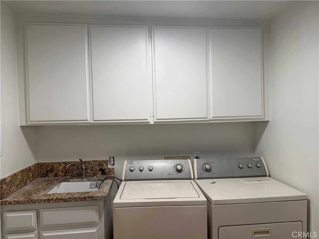 27282 Via Bella Dana Point, CA 92624 - Photo 50 of 50 a utility room with dryer and washer