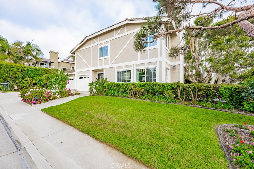 27282 Via Bella Dana Point, CA 92624 - Photo 8 of 50 a front view of a house with garden