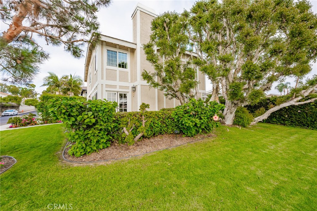 27282 Via Bella Dana Point, CA 92624 - Photo 9 of 50 a view of a big yard with plants and large trees