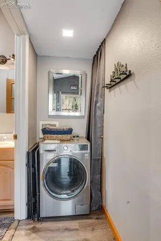 a view of a storage & utility room with a washer and dryer
