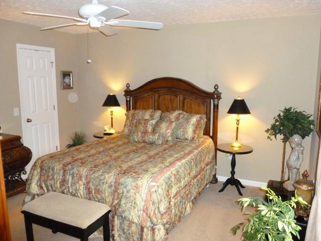489 Skinner Flat Road Manchester, TN 37355 - Photo 10 of 20 Bedroom master bed with walk in closets