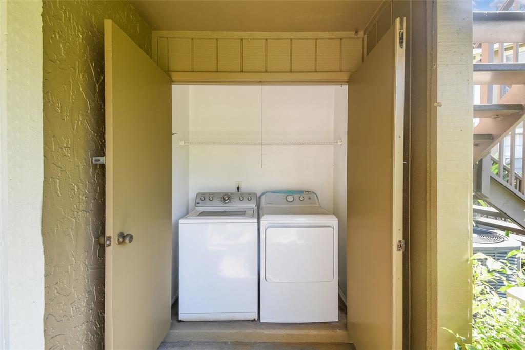 4208 Winding Moss Trail, Unit 102 Tampa, FL 33613 - Photo 21 of 27 a room with storage and utility