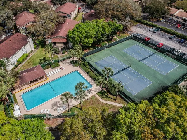 an aerial view of a house with a garden