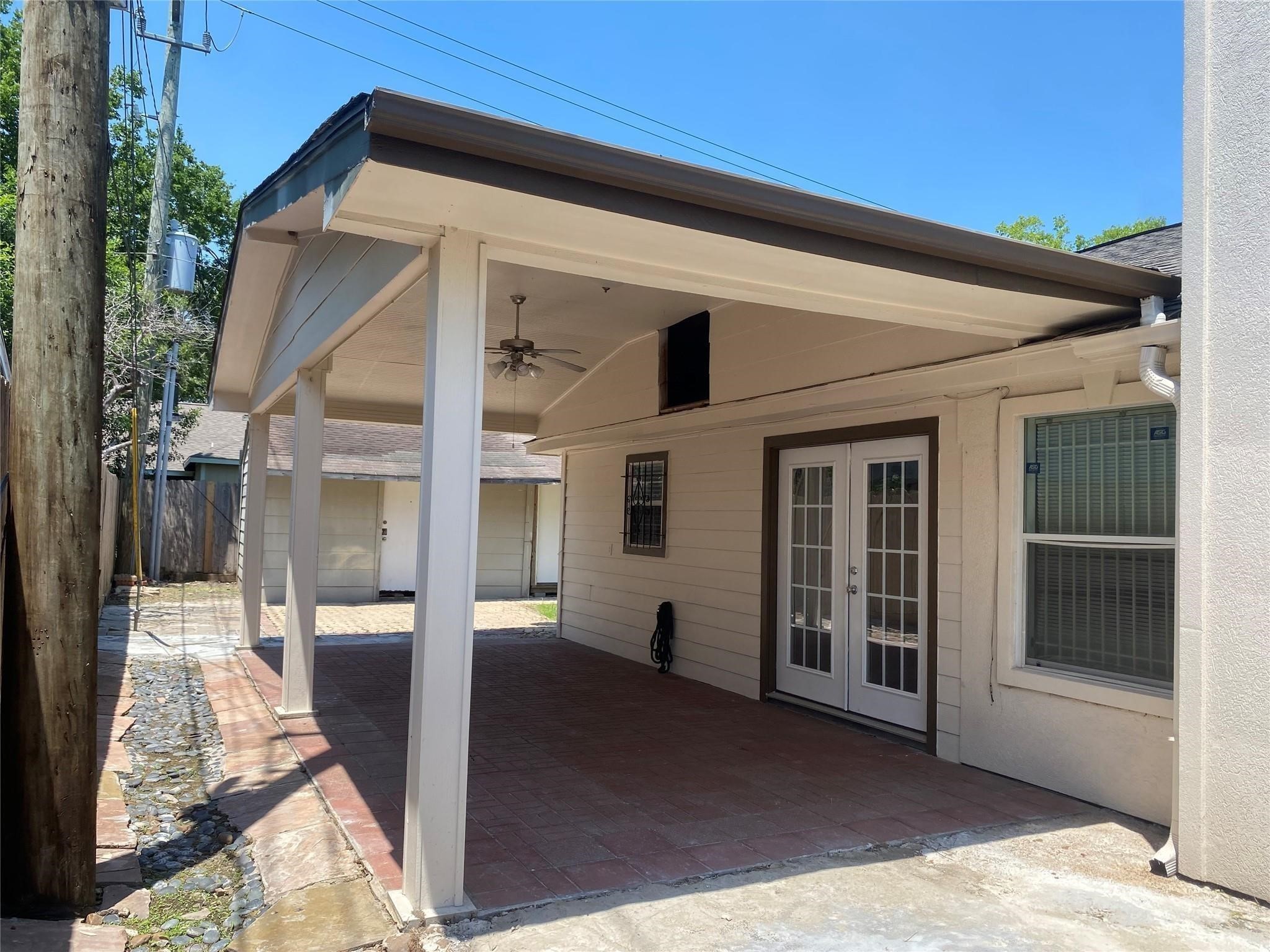 3226 Brookston Street Houston, TX 77045 - Photo 22 of 24 a view of a house with backyard and sitting area