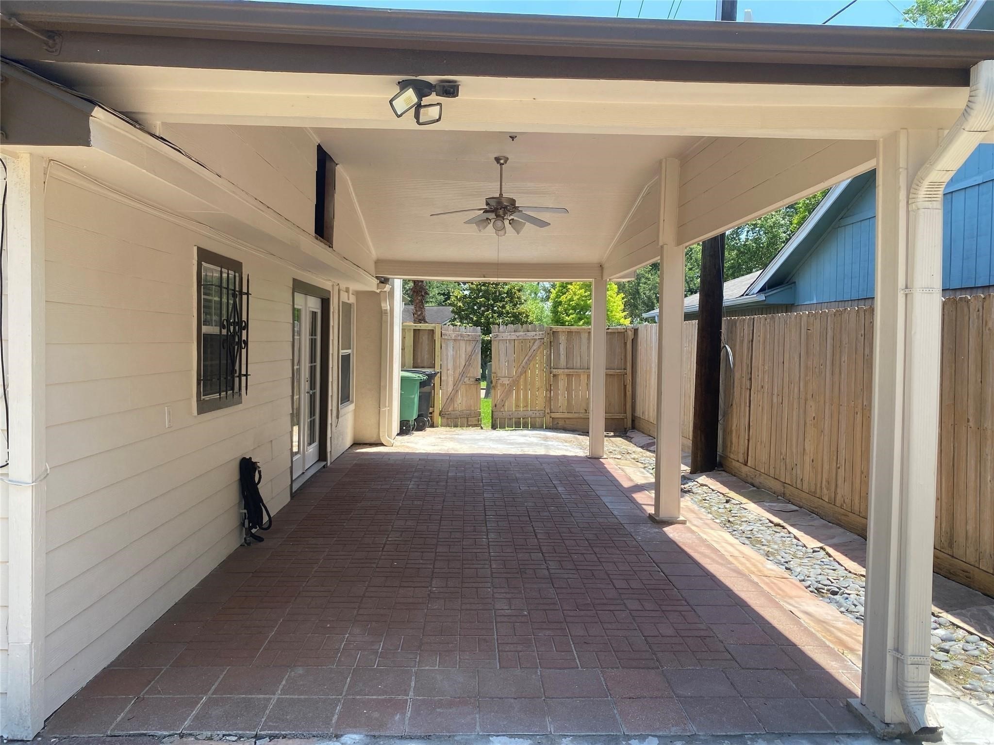 3226 Brookston Street Houston, TX 77045 - Photo 24 of 24 a view of room with window and a ceiling fan