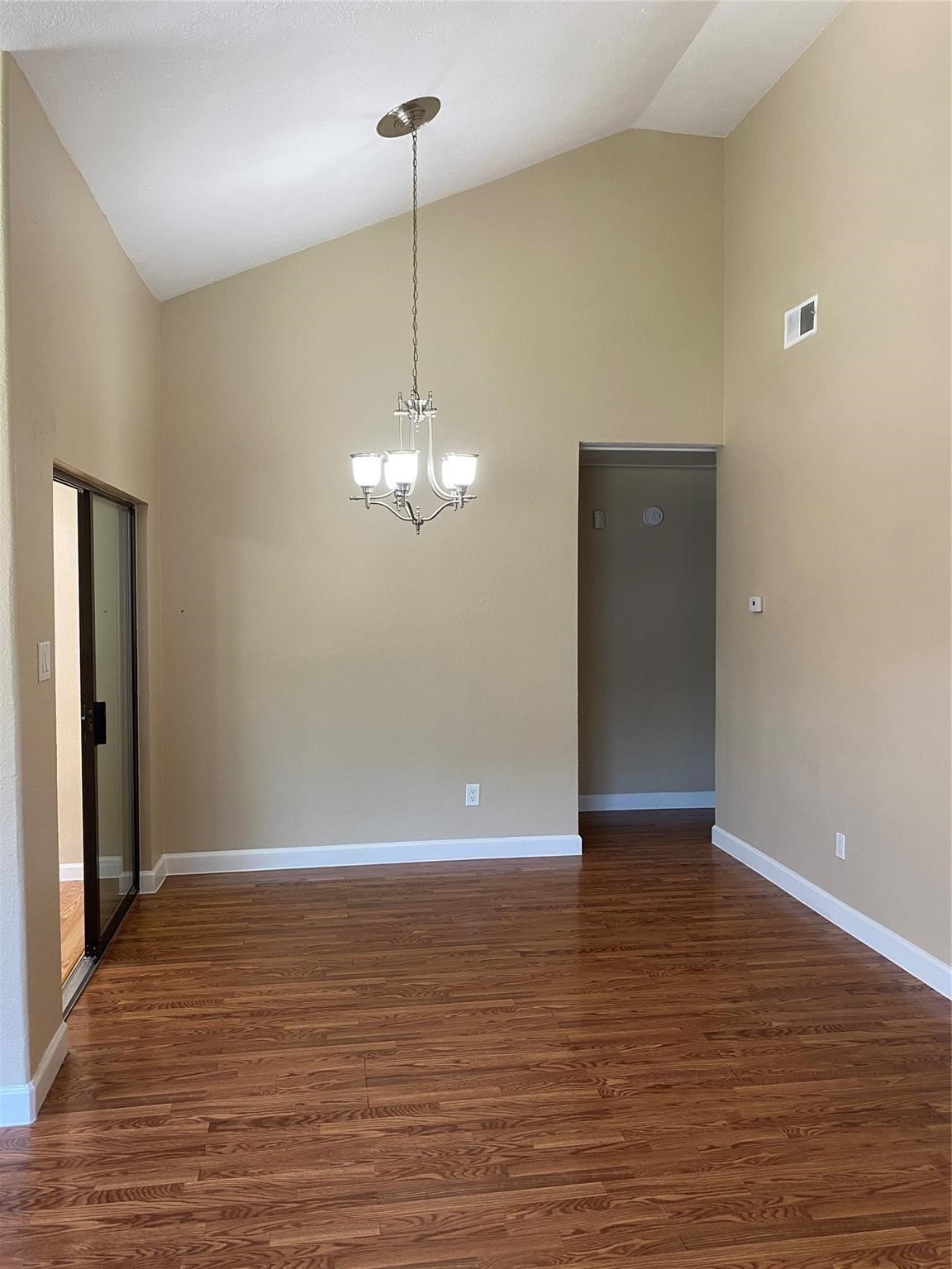 3226 Brookston Street Houston, TX 77045 - Photo 4 of 24 a view of empty room with wooden floor
