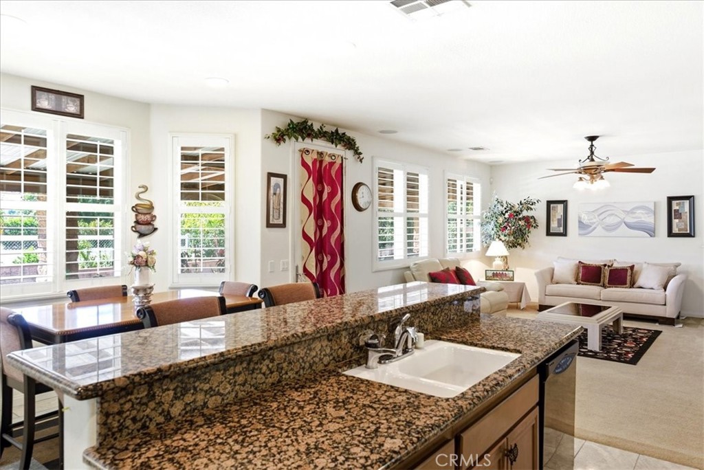 17715 Timberview Drive Riverside, CA 92504 - Photo 11 of 39 Kitchen open to family room.
