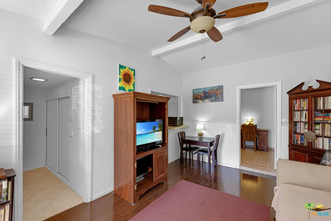 71770 San Gorgonio Road Rancho Mirage, CA 92270 - Photo 36 of 45 a living room with furniture and a flat screen tv