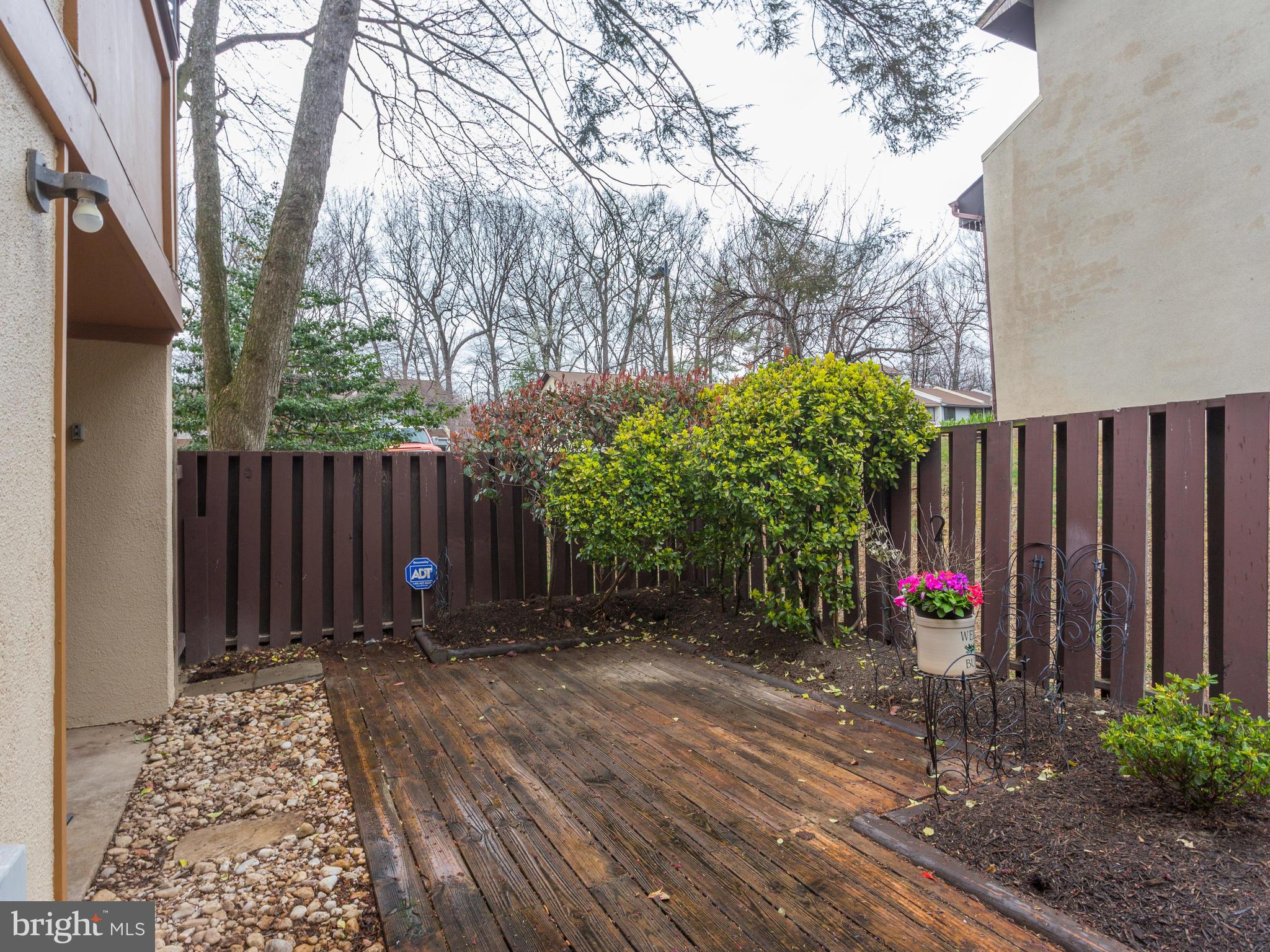 2217 Coppersmith Square Reston, VA 20191 - Photo 22 of 30 Exterior (Rear) Nice patio with landscaping