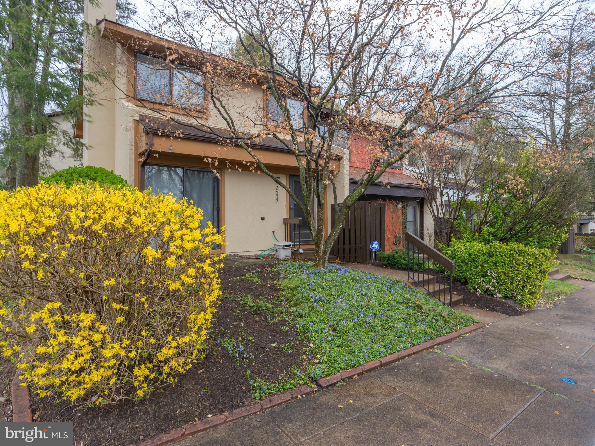 2217 Coppersmith Square Reston, VA 20191 - Photo 25 of 30 Exterior (Front) Pretty in the spring.
