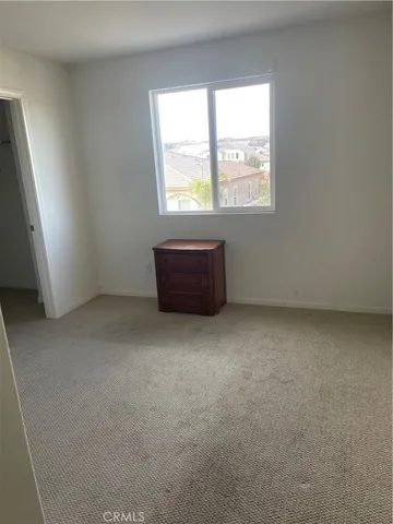 a view of livingroom with furniture and window