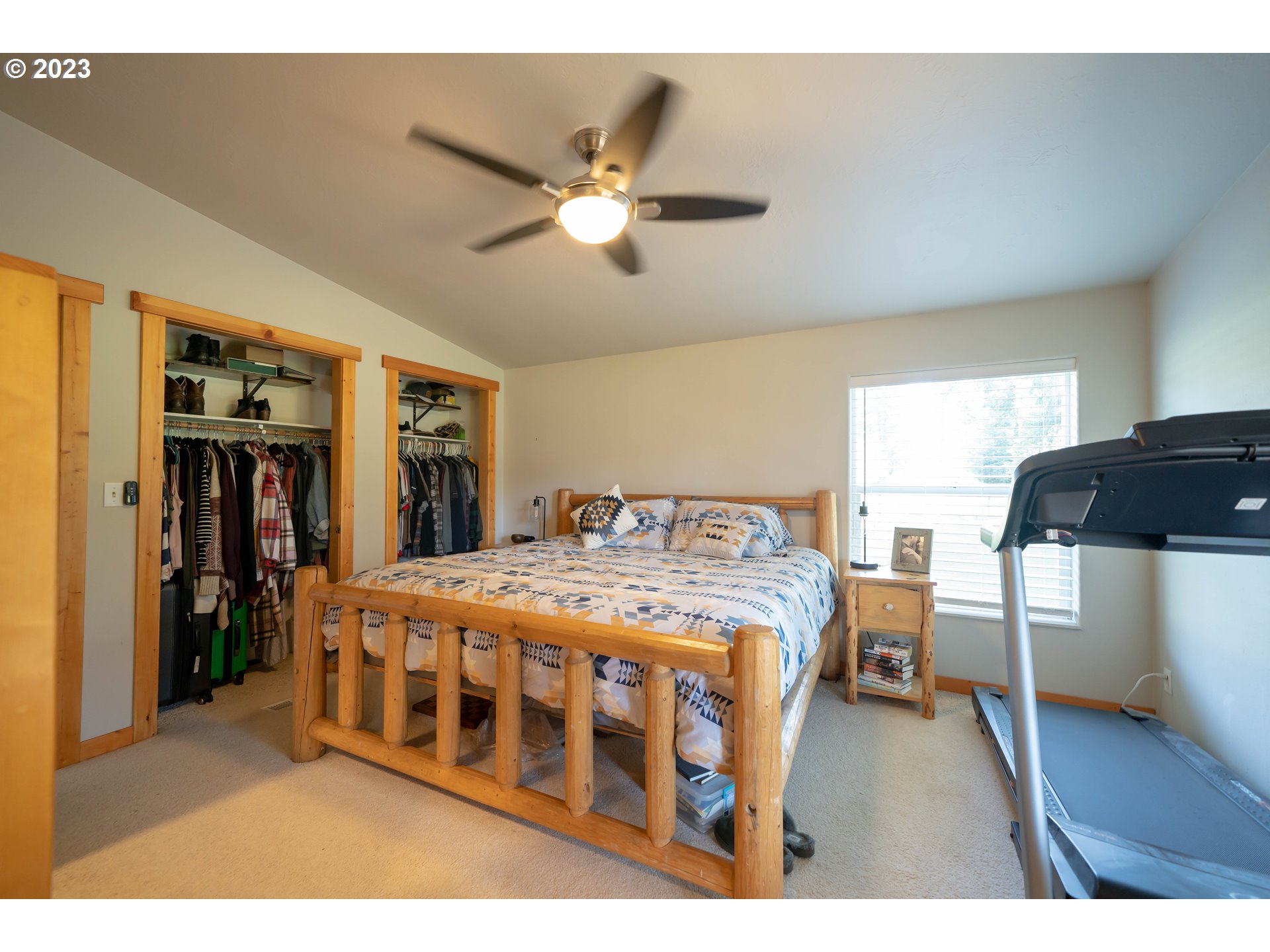 40766 North Mowitch Lyons, OR 97358 - Photo 11 of 31 a living room with a bed furniture and a window