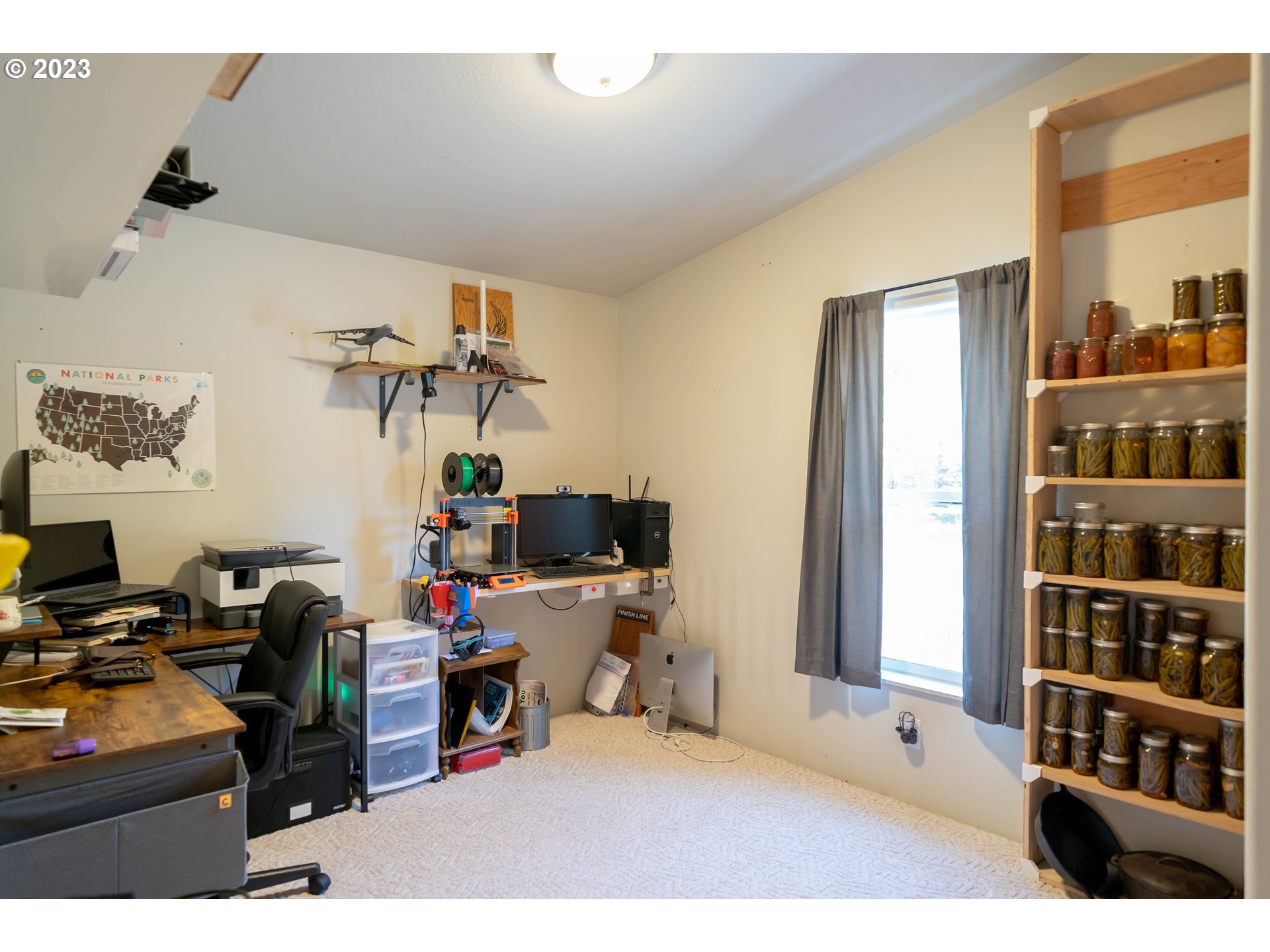 40766 North Mowitch Lyons, OR 97358 - Photo 15 of 31 a room with a workspace and a window
