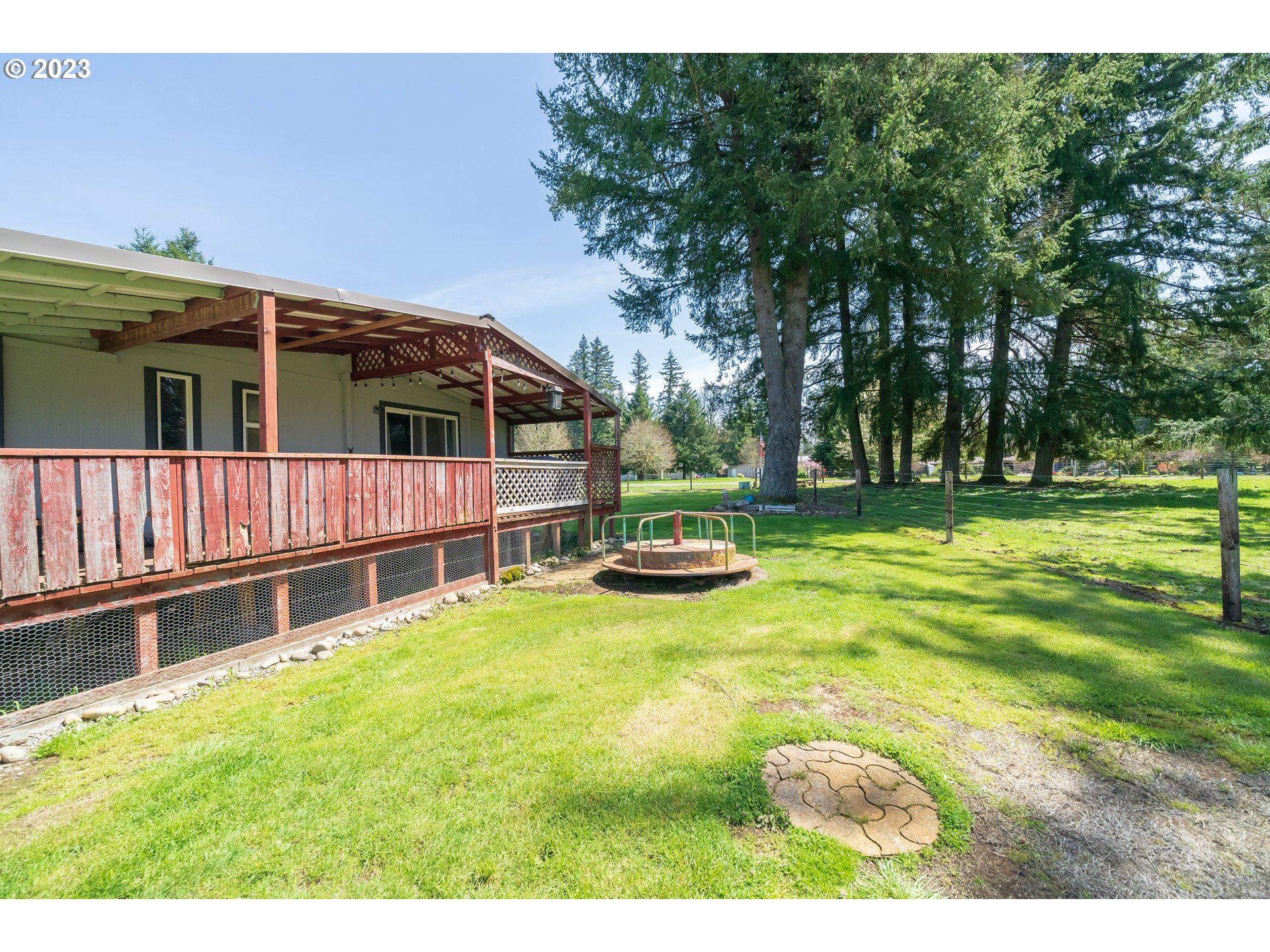 40766 North Mowitch Lyons, OR 97358 - Photo 18 of 31 a view of a house with swimming pool and sitting area